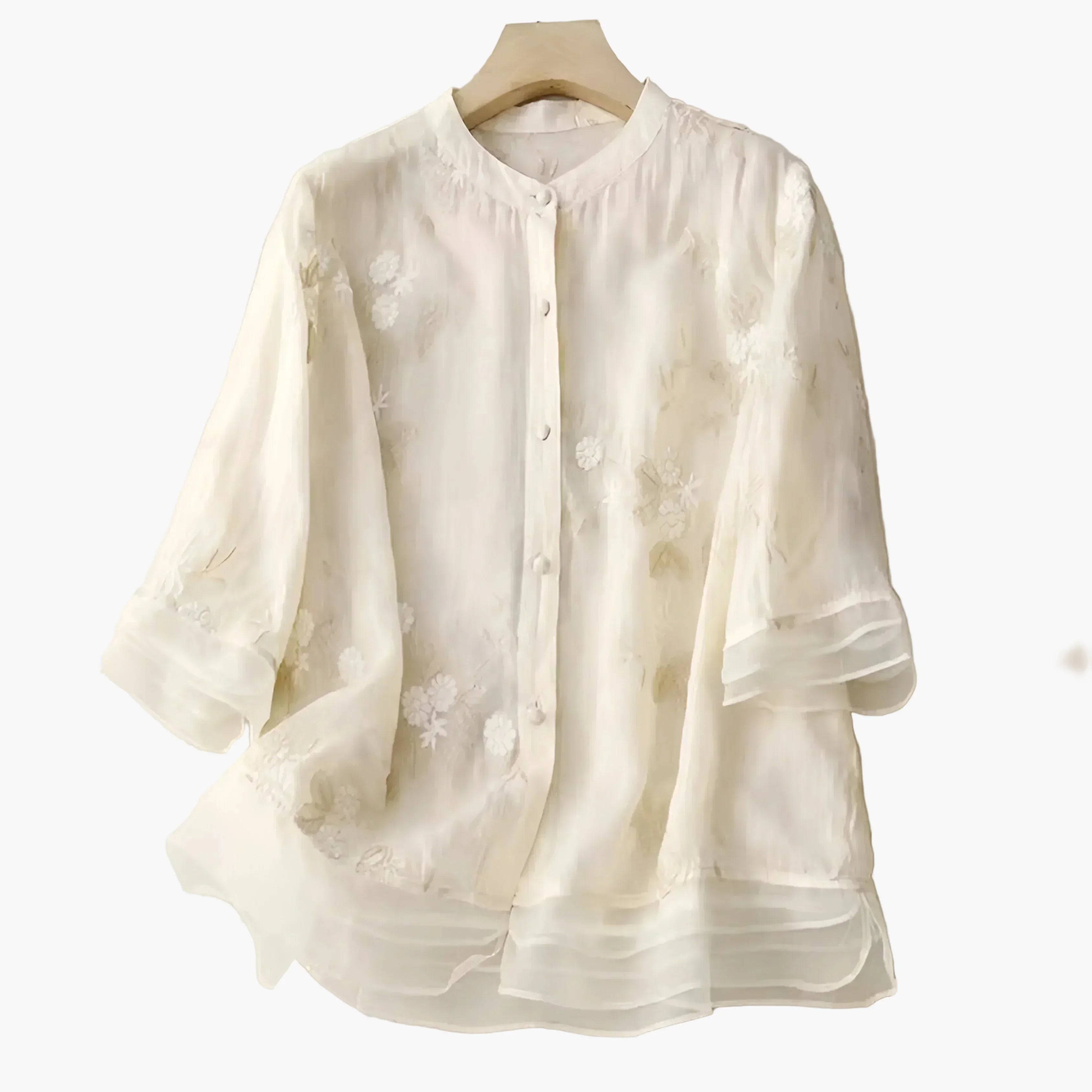 Damblus med broderade blommor och avslappnad